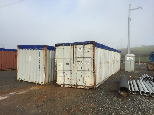Four (4) open top storage containers